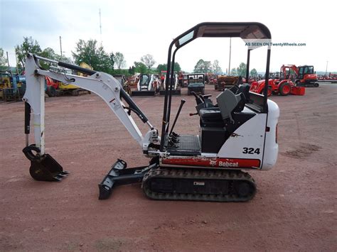 mini excavator with adjustable tracks bobcat|bobcat mini excavator specifications.